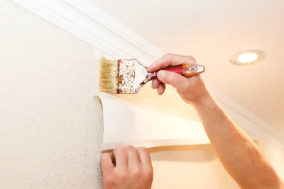 Pose de papier peint à Sourans — revêtements muraux et toiles de verre